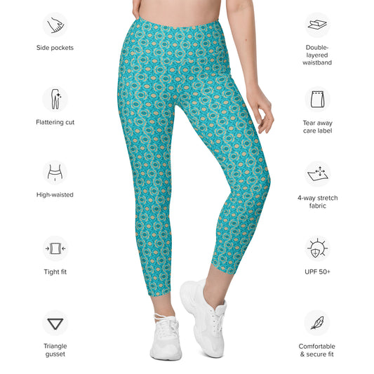 Detailed features of turquoise pickleball leggings showing icons for UPF 50+ protection, stretch fabric, side pockets, and eco-friendly certification labels