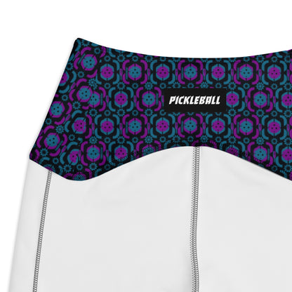 Close-up view of the high-waisted Purple Playmaker Pickleball Leggings waistband, showcasing the colorful pickleball-themed pattern in purple and blue with the word 'Pickleball' prominently displayed on a black background.