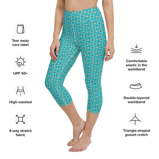 Detailed product shot of Turquoise Tranquility Yoga Capri Leggings with icons illustrating key features like UPF 50+ protection, high waistband, and 4-way stretch fabric, ideal for pickleball players and fitness enthusiasts.