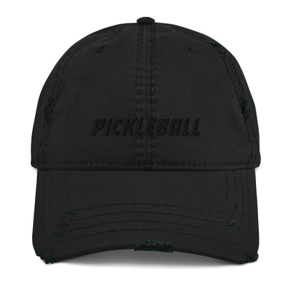 Front view of a distressed black hat with 'PICKLEBALL' text embroidered in black, blending with the cap's color for a monochromatic look.