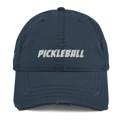 Front view of a navy distressed pickleball hat with 'PICKLEBALL' embroidered in white on the front, highlighting the vintage style.