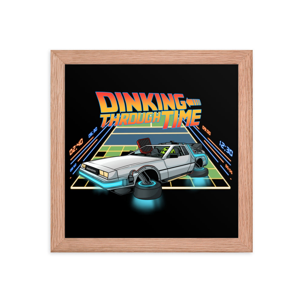 Framed poster of a DeLorean with the text 'Dinking Through Time' in a red oak frame, size 10x10 inches.