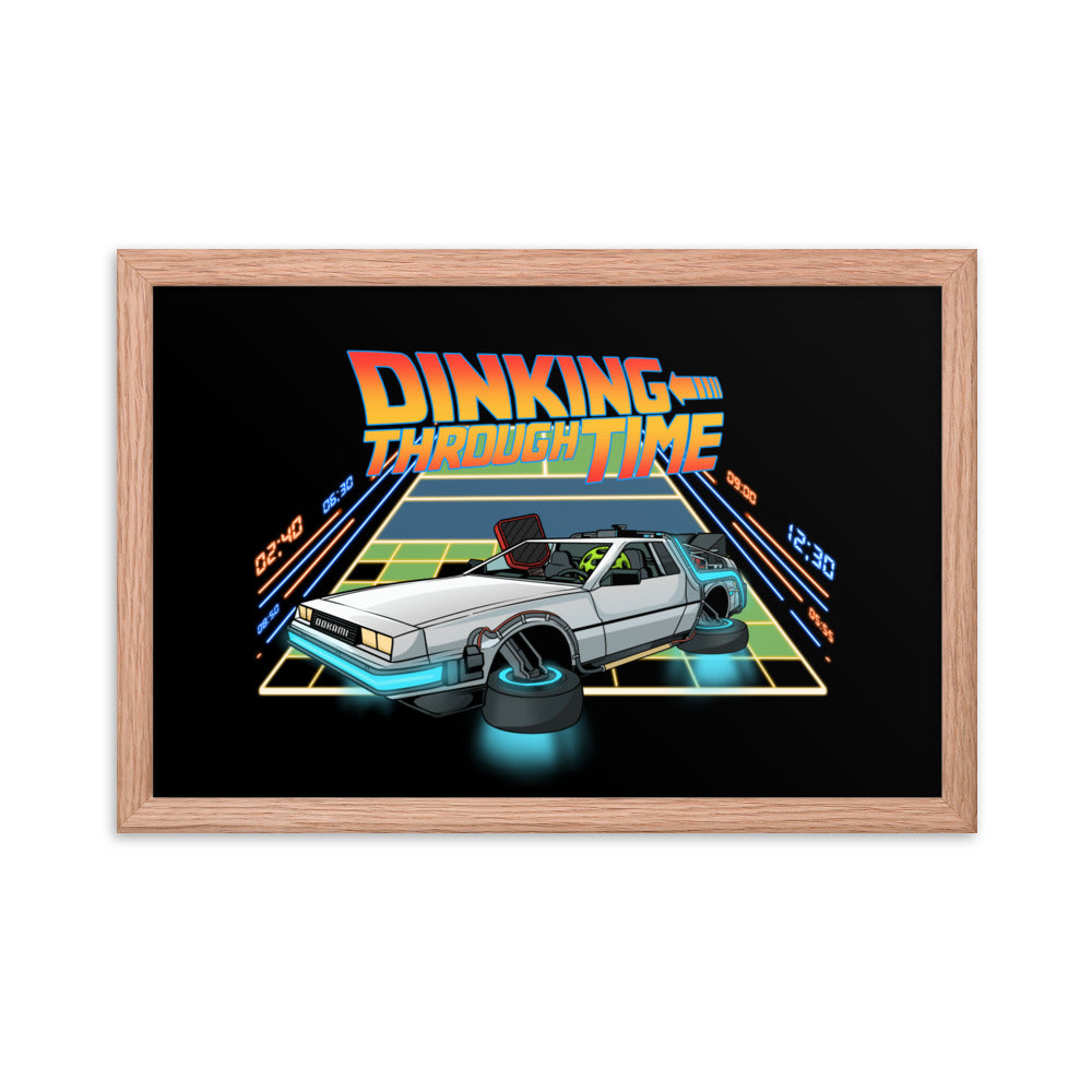 Framed poster of a DeLorean with the text 'Dinking Through Time' in a red oak frame, size 12x18 inches.