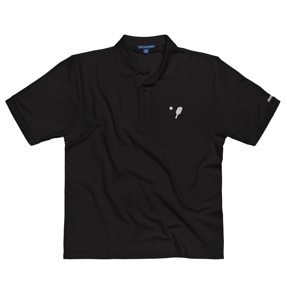 Front view of OOKAMI SPORTS Men's Premium Pickleball Polo in black, featuring a structured fit with side vents and a sophisticated flat knit collar for on and off the court wear.