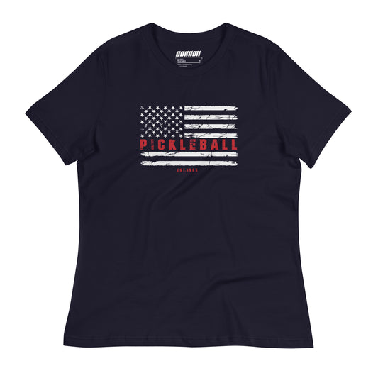 Front view of a navy Women's Relaxed T-Shirt with a USA flag and "Pickleball" design.