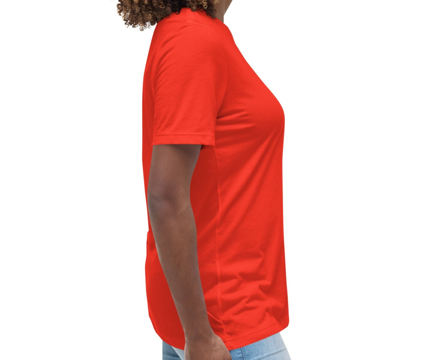 Side view of a woman wearing a poppy Women's Relaxed T-Shirt with a Pickleball Game Time design.